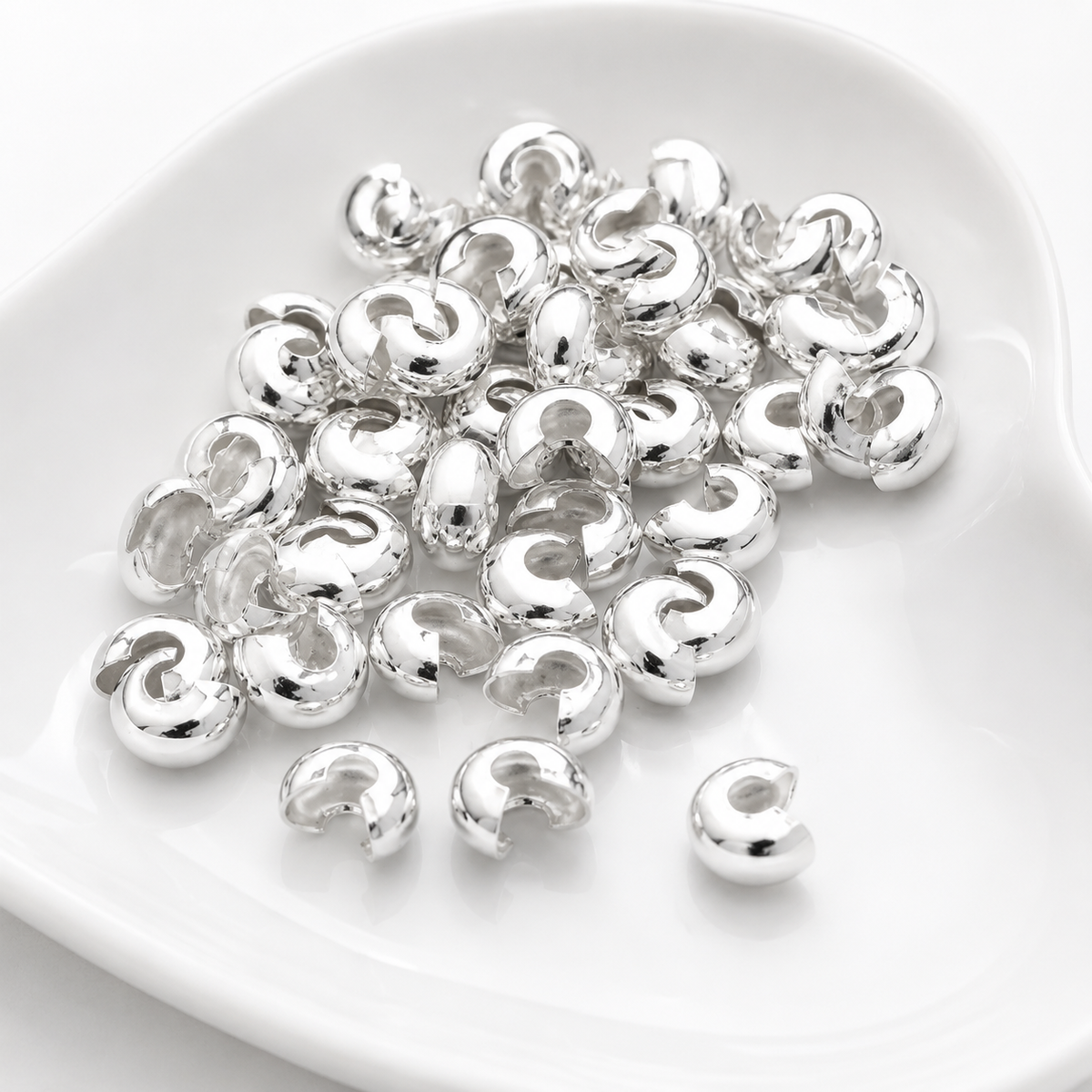 TAPANUDO CARACOL PLATEADO FANTASIA 4mm - 100pcs